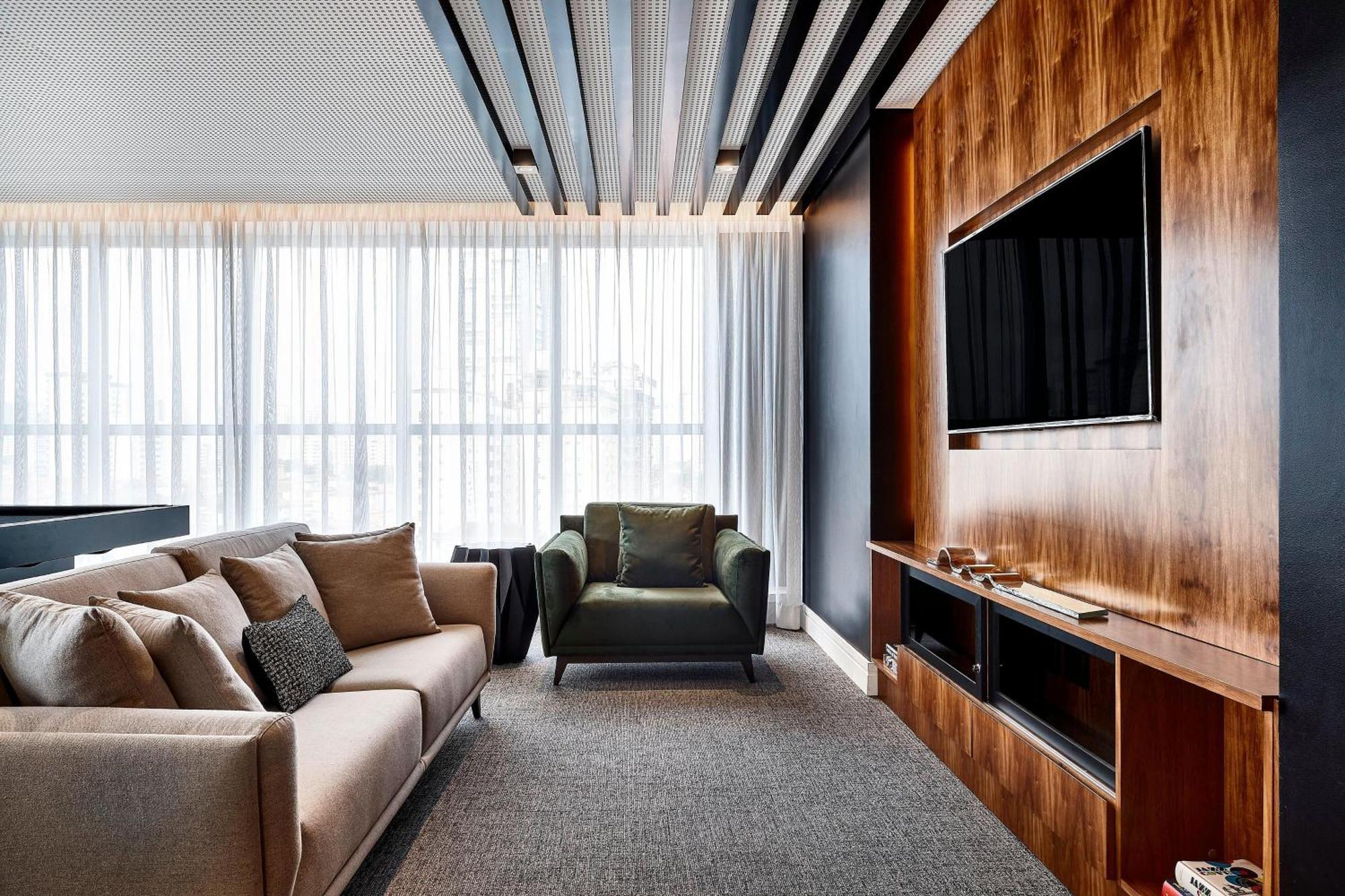 Sheraton Santos Hotel Εξωτερικό φωτογραφία A living room with a television